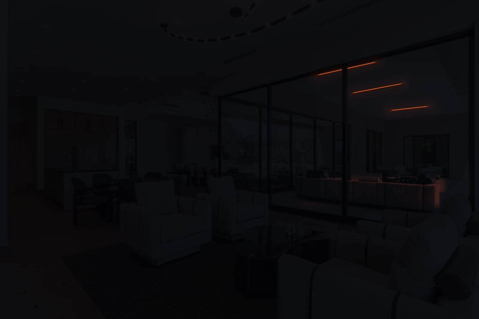 Phoenix Interior Design Phoenix Interior Design great room at night: swivel chairs around a black lacquer coffee table beneath a bulb chandelier, a white oak kitchen with a black marble island, and black-framed sliding glass opening to the Arizona desert